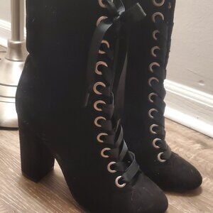 Lace up black suede boots